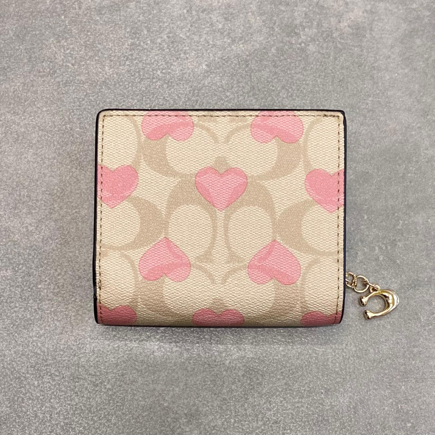 Ví Coach Women's Folding Short Wallet with Heart In Signature Canvas DS Beige -